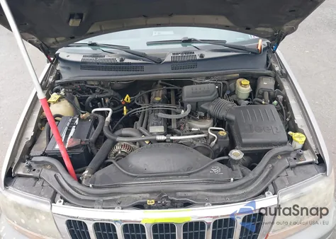 1999 Jeep Grand Cherokee Laredo из США, поврежденный, VIN 1J4GW58S1XC673530